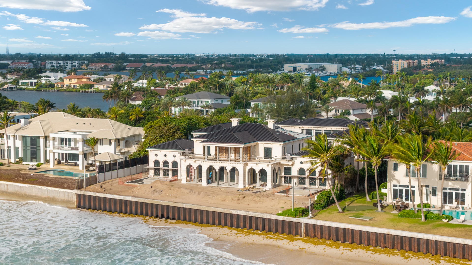 Mid-construction drone photo of an oceanfront residence